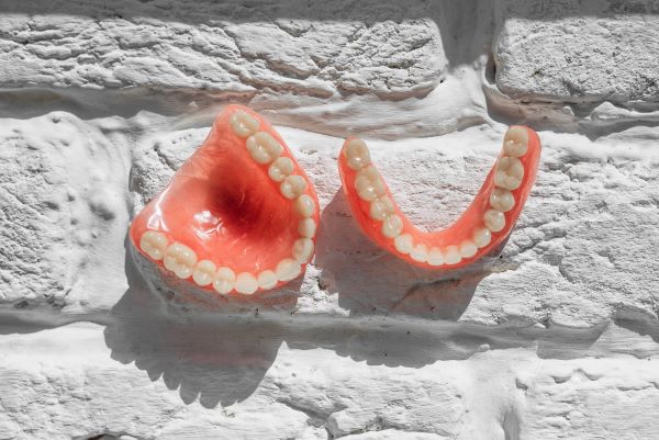 3D-printed dental implant or orthodontic device for dental treatment.