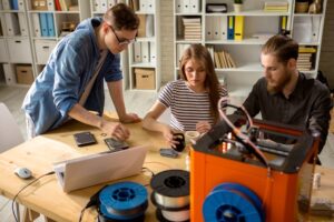 Various models of 3D printers and printing materials on display