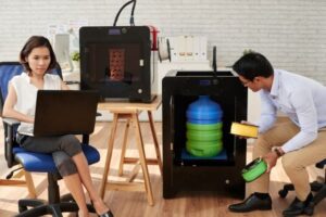 A 3D printing workspace with multiple printers